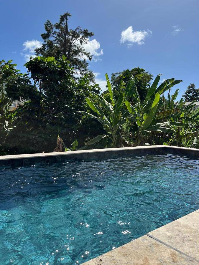 Appartement de vacances pour 4 personnes, avec jardin ainsi que piscine et vue