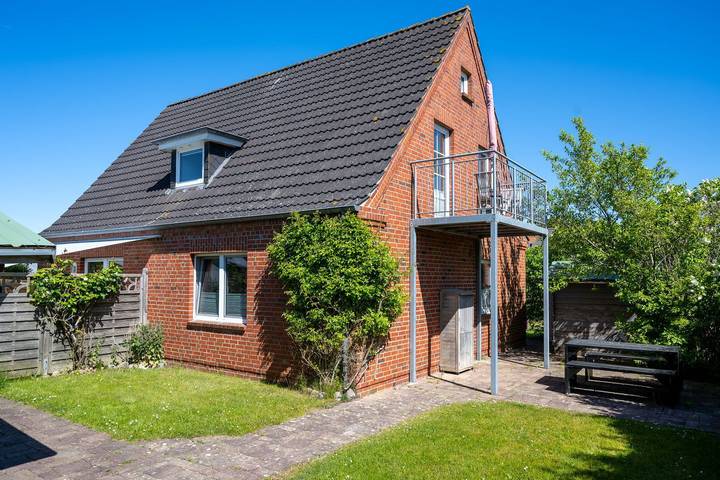 Ferienwohnung für 5 Personen, mit Balkon und Terrasse sowie Garten