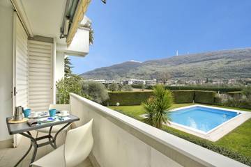 Ferienwohnung für 4 Personen, mit Pool und Balkon, kinderfreundlich in Riva del Garda