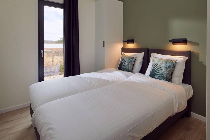 Lodge voor 6 personen, with sauna and uitzicht op het meer as well as tuin in de Achterhoek