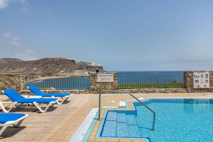 Apartamento entero, Vivienda vacacional Su Eminencia cerca de la playa con vistas al mar y piscina compartida in Playa del Cura, Mogán