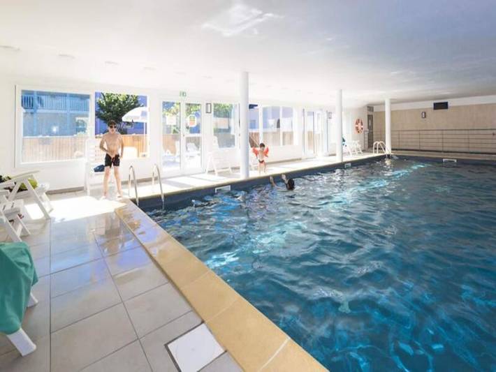 Appartement de vacances pour 8 personnes, avec piscine ainsi que sauna et terrasse, adapté aux familles