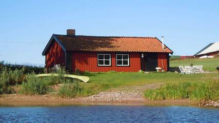 Ferienhaus für 4 Personen, mit Garten und Terrasse sowie Ausblick, mit Haustier in Gullspang