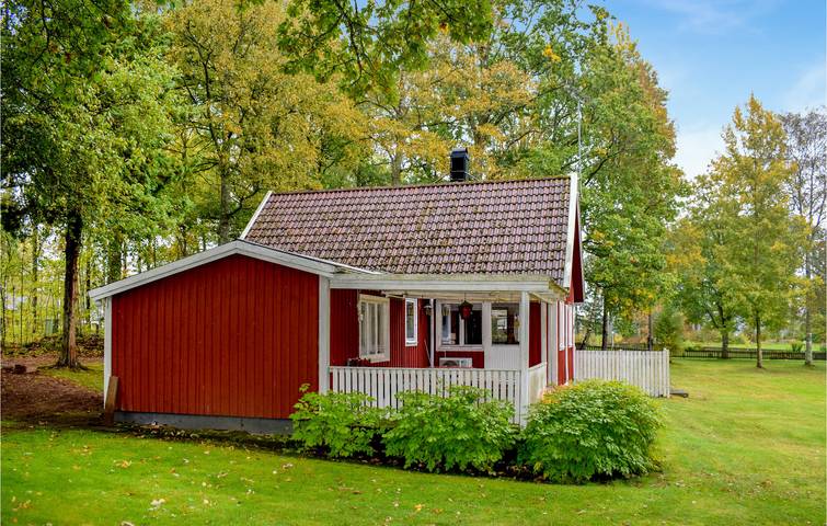Ferienhaus für 6 Personen, mit Terrasse und Garten sowie Seeblick