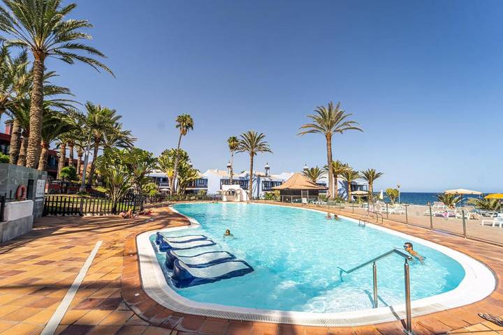 Appartement de vacances pour 3 personnes, avec vue ainsi que jardin et piscine