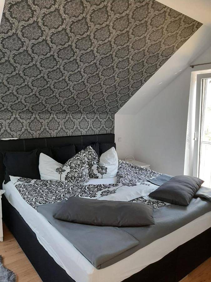 Ferienwohnung für 4 Personen, mit Terrasse und Garten sowie Ausblick