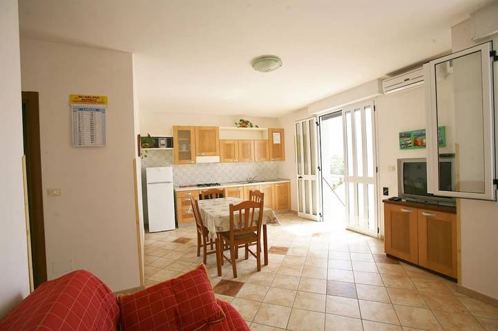 Location de vacances pour 4 personnes, avec balcon et jardin à Torre San Giovanni