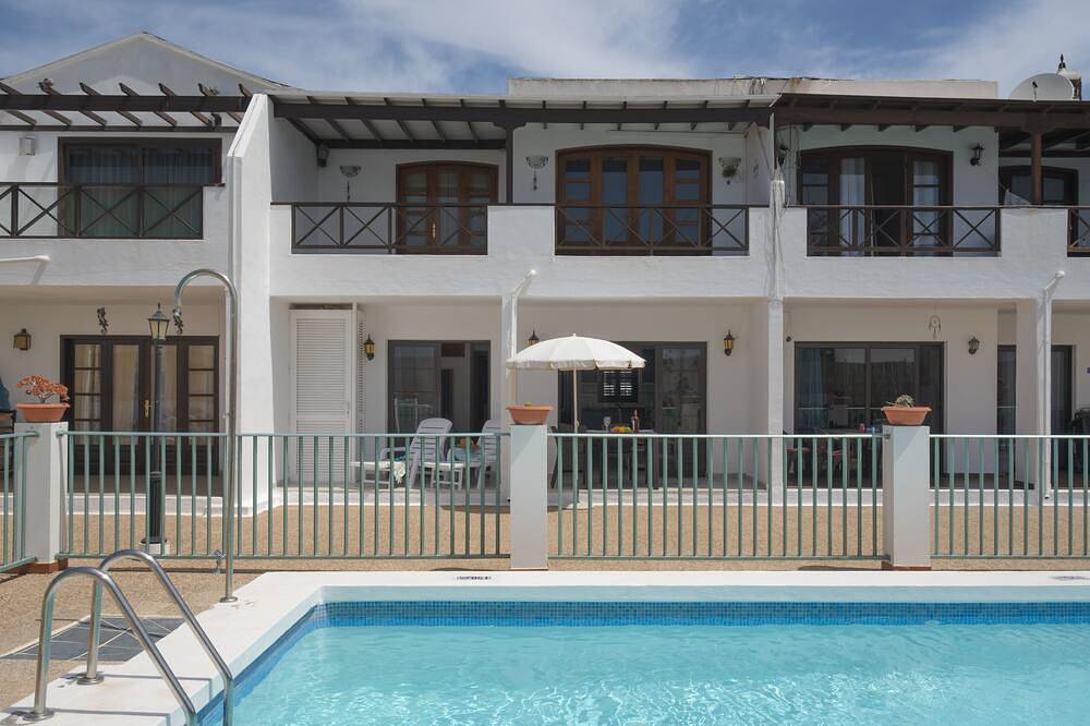 Apartamento entero, Maravilloso Apartamento en Puerto del Carmen con piscina comunitaria, Wifi gratuito in Puerto del Carmen, Tías