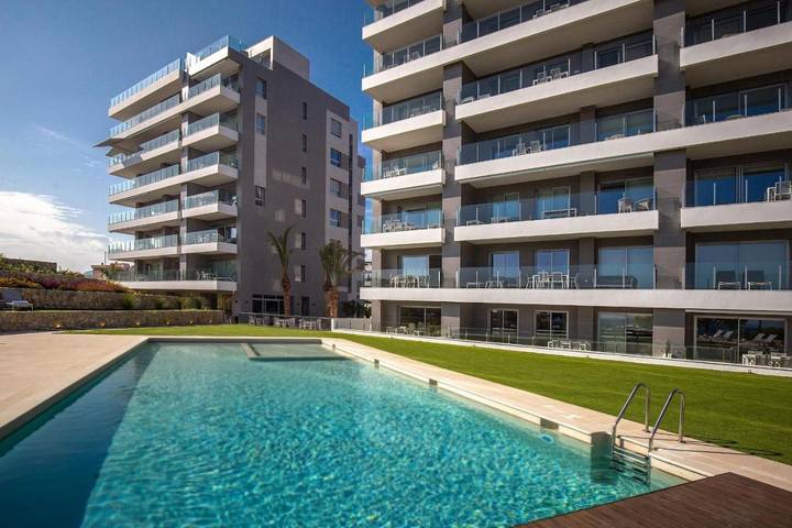 Apartahotel para 5 personas, con Balcón y Terraza además de Jardín y Piscina para niños en Villajoyosa