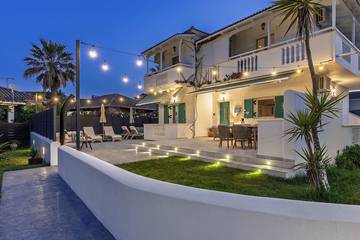 Ferienwohnung für 6 Personen, mit Balkon und Garten in Kalamaki