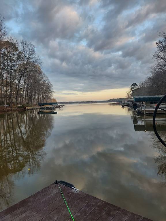 Breathtaking porch just steps from the water. in Lake Oconee