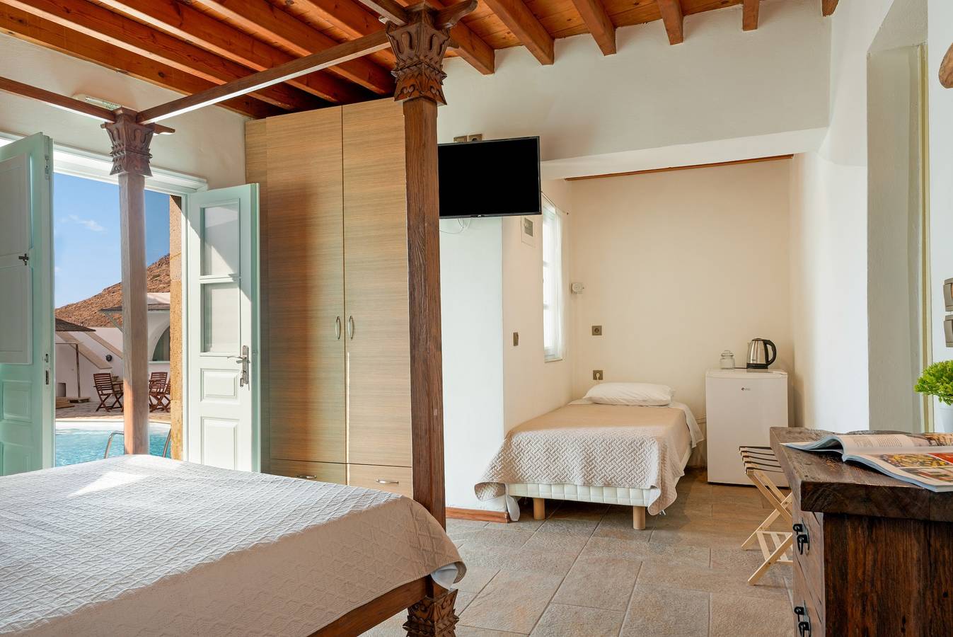 Room 'Triple Pool View No 1' with Shared Pool, Wi-Fi and Air Conditioning in Skala (Patmos), Dodecanese