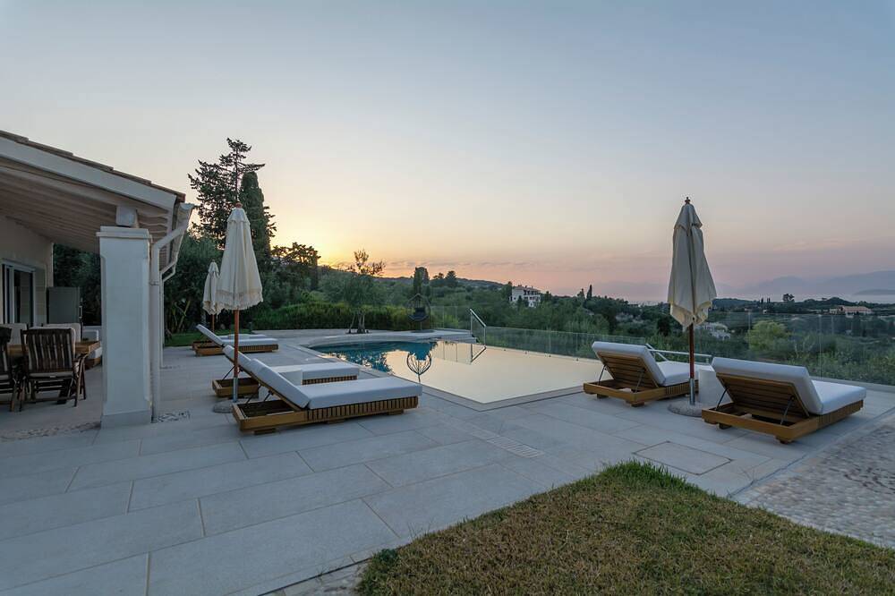 Private Villa at the headline with a panoramic view close to the main village in Kassiopi, Corfu