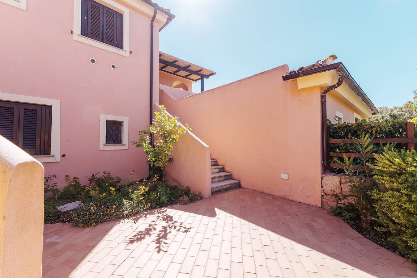 Appartement entier, Appartement « Casa Vacanze Arancia » avec piscine partagée, terrasse privée et climatisation in Maltineddu, Olbia