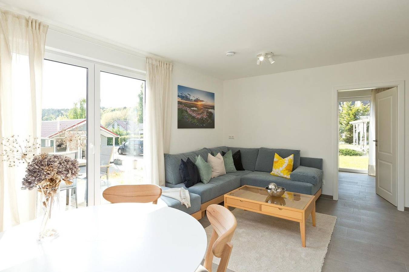 Ganze Wohnung, Komfortable Ferienwohnung - Haus an der Sonne Eg 107 - mit Terrasse & Sauna in Röbel, Müritz