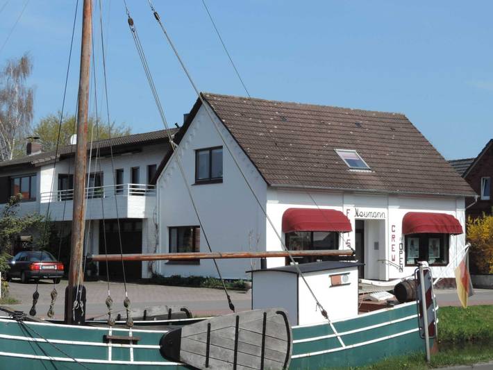 Ferienwohnung für 4 Personen, mit Balkon und Garten, kinderfreundlich in Rhauderfehn
