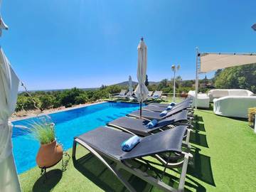 Location de vacances pour 16 personnes, avec jardin et vue sur le lac dans Estoi