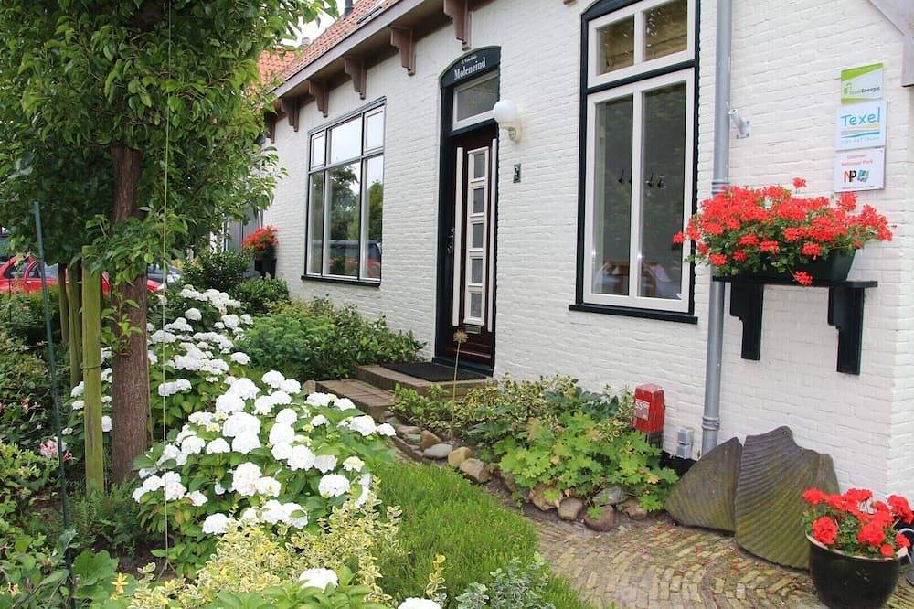 Stilvolle Wohnung mit Garten in einem ehemaligen Bauernhaus in De Waal in De Waal, Westfriesische Inseln