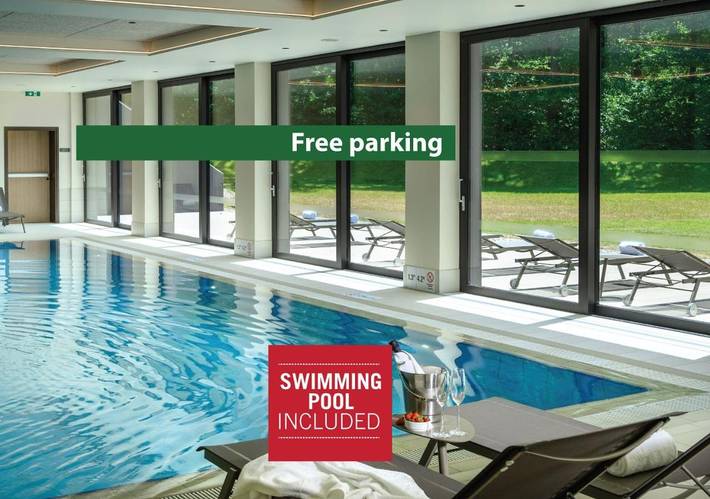 Hôtel pour 3 personnes, avec Terrasse et Jardin ainsi que Piscine et Sauna