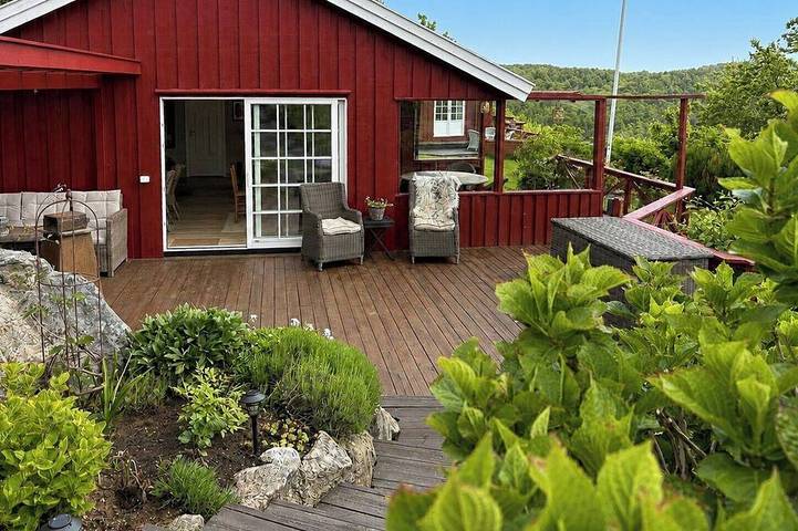 Ferienhaus für 4 Personen, mit Balkon und Garten