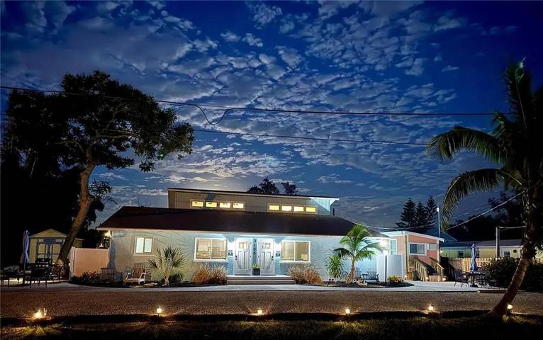 Appartement de vacances pour 4 personnes, avec jardin ainsi que terrasse et vue sur le lac, animaux acceptés