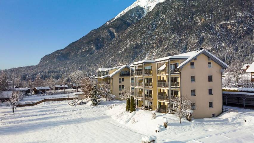Ferienwohnung für 3 Personen, mit Seeblick und Sauna sowie Garten und Ausblick am Pressegger See