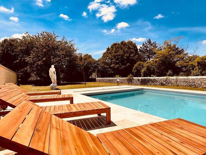 Location de vacances pour 15 personnes, avec Terrasse et Jacuzzi ainsi que Piscine et Sauna à Rauzan