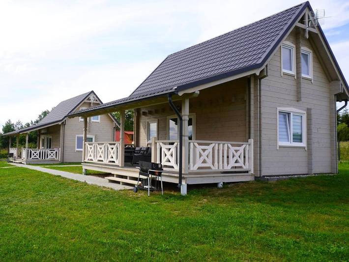 Domek letniskowy dla 8 osób, z Taras i Jacuzzi oraz Ogród i Sauna w Giżycko