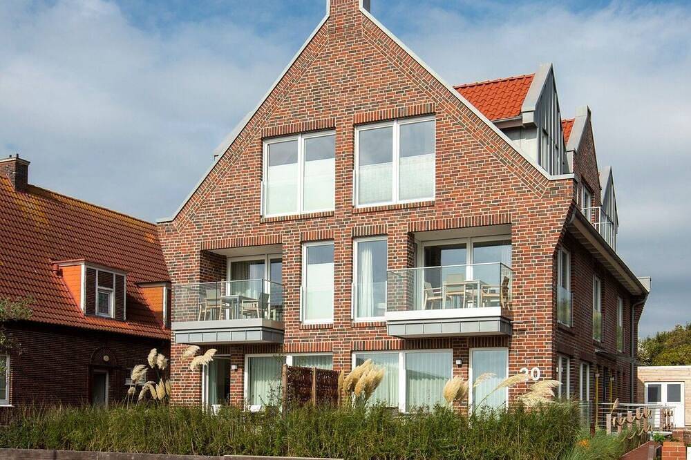 Familien- und hundefreundliche moderne Ferienwohnung mit Südterrasse am Watt — Bild 4