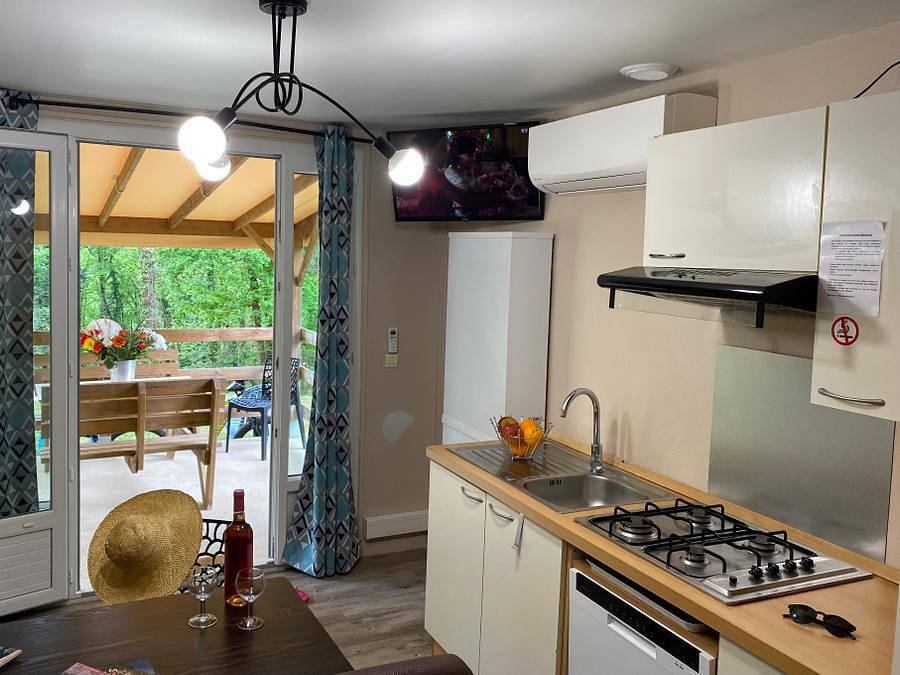 Camping La Chêneraie **** - Gîte 4 personnes - Cottage La Gariotte - 4 personnes - 2 chambres - Climatisé - Télévision - Lave-vaisselle - S in Saint-Géry-Vers, Parc Naturel Régional des Causses du Quercy