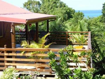 Maison de campagne pour 2 personnes, avec vue et jardin, adapté aux familles à Deshaies