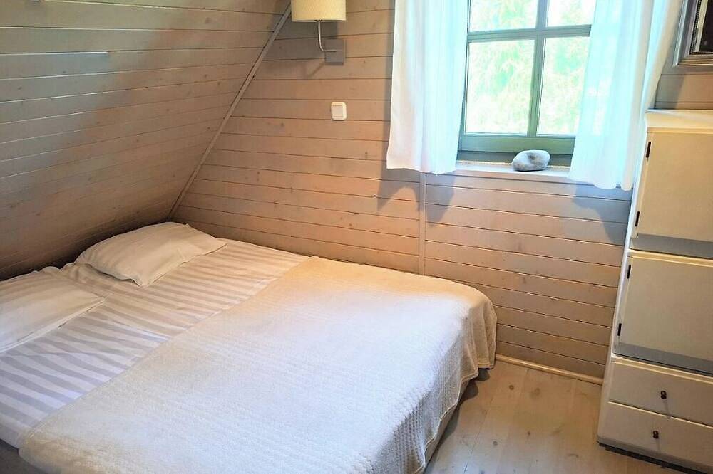 Sommerhaus aus Holzbalken in Mauersee