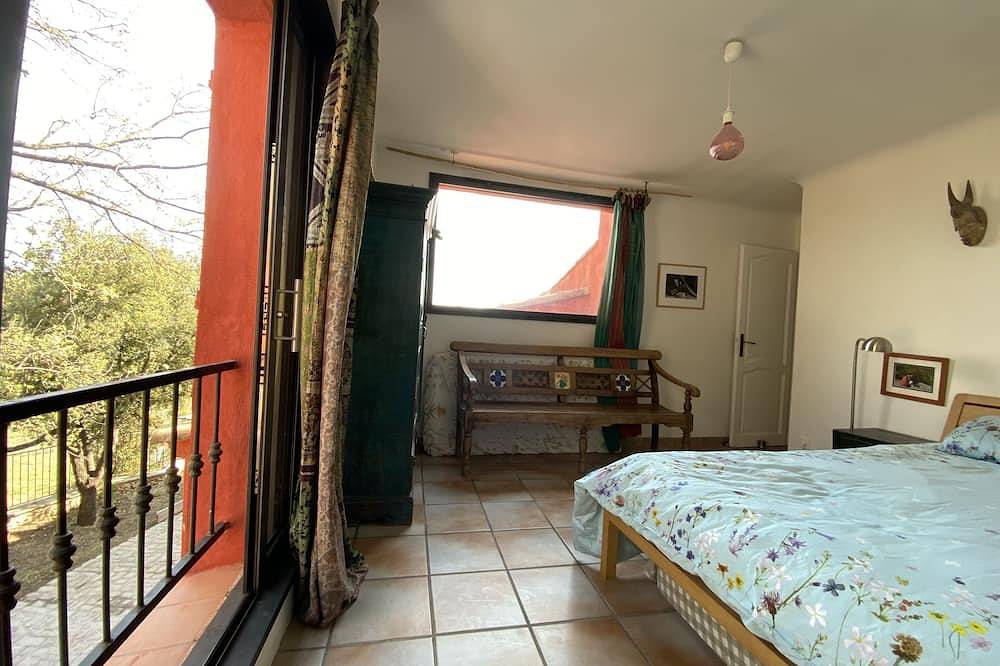Dreaming in Provence among the olive trees, with a view of the Sainte Beaume mountain range in Barjols, Brignoles region