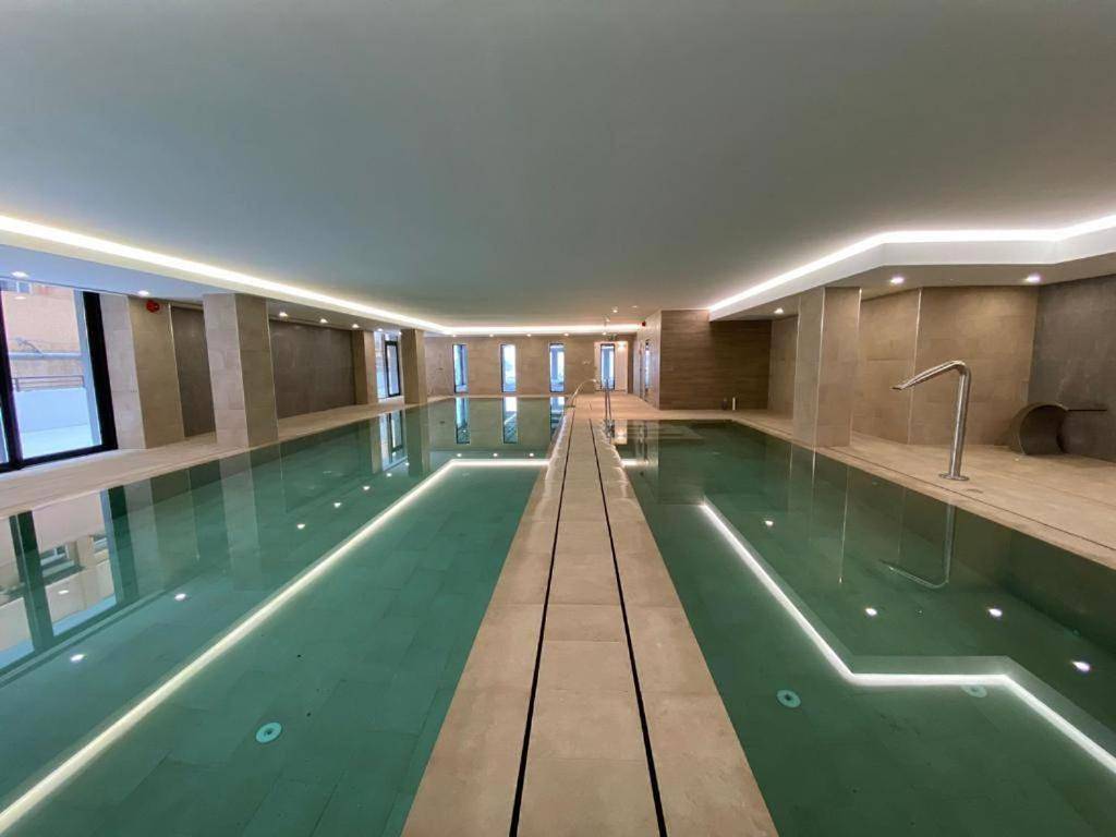 Appartement entier, Cp Top floor luxury studio with spa and pool in Costa de la Luz