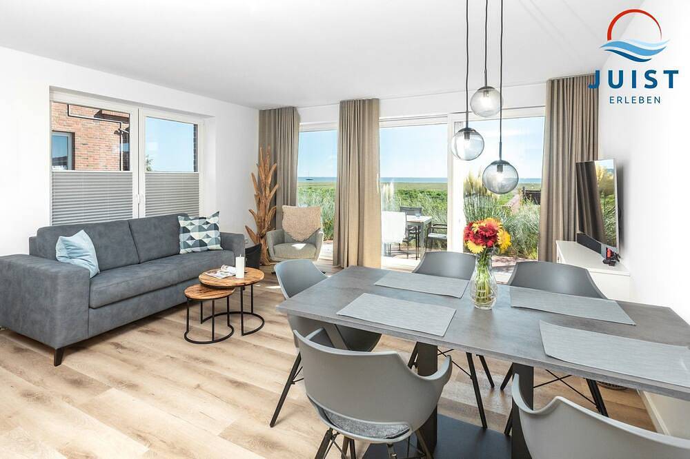 Familien- und hundefreundliche moderne Ferienwohnung mit Südterrasse am Watt