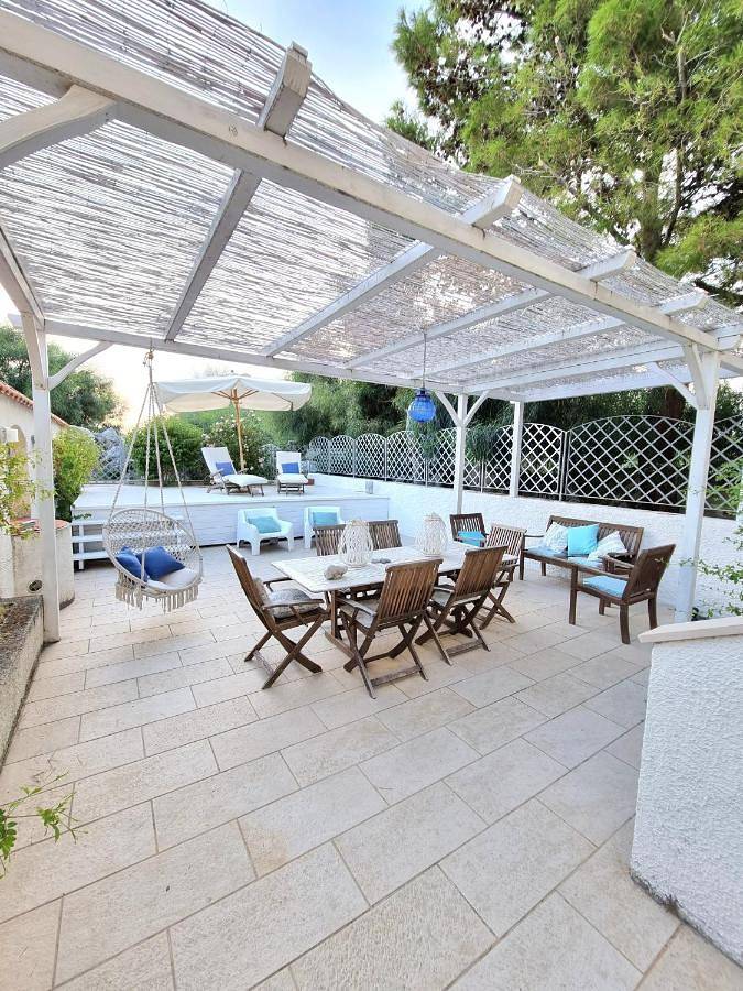Casa vacanza per 9 persone, con Balcone e Terrazza nonché Giardino e Panorama a Falerna Marina