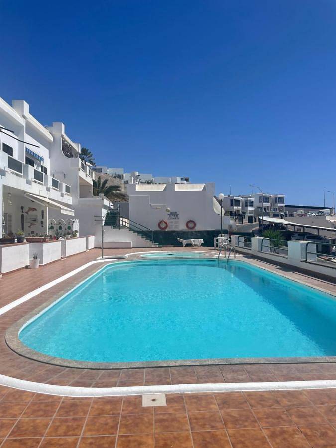 Vakantiewoning voor 3 personen, with balkon and uitzicht as well as zwembad and kinderzwembad in Puerto Rico (Gran Canaria)