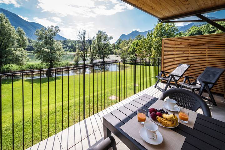 Vacation rental for 4 people, with yard and lake view as well as sauna in Lake Lugano