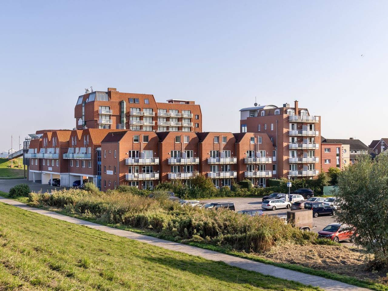 Ganze Ferienwohnung, Hus Inselkieker - Familienfreundliche Ferienwohnung an der Nordsee mit Balkon und Blick zum Deich in Schillig Strand, Wangerland