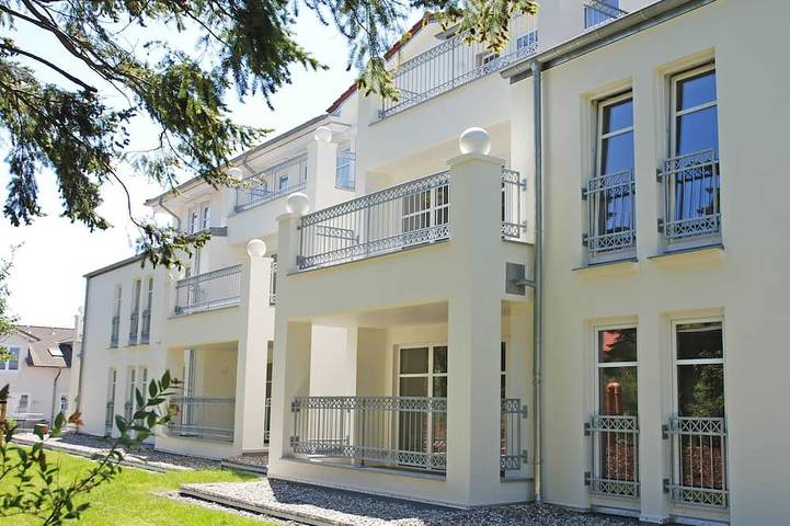 Ferienwohnung für 4 Personen, mit Balkon und Garten sowie Sauna