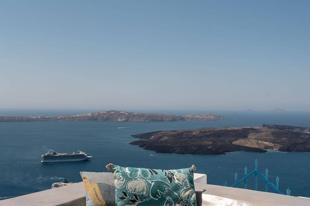 Villa cueva de lujo, vista a la caldera, piscina climatizada in Firostefani, Imerovigli