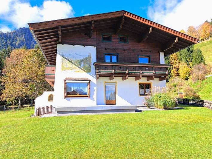 Ferienhaus für 9 Personen, mit Balkon und Garten sowie Ausblick in Wald im Pinzgau