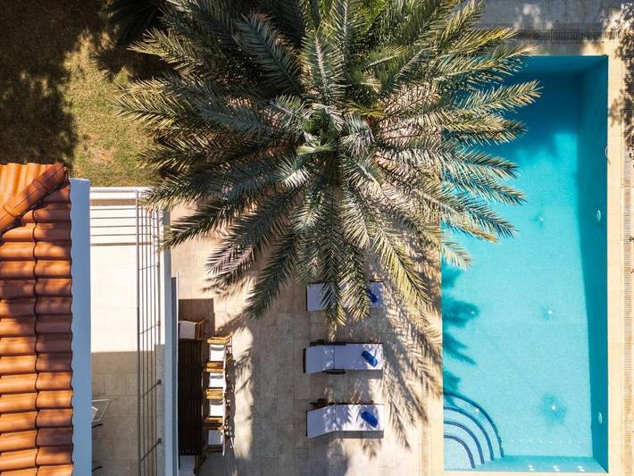 Location de vacances pour 12 personnes, avec piscine ainsi que vue et jardin dans Saronida - 3