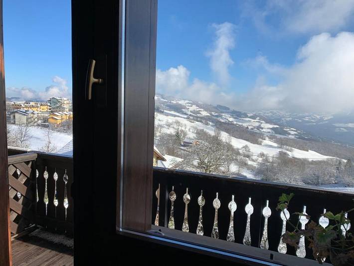 Appartamento per 5 persone, con Balcone e Terrazza nonché Giardino e Panorama in Cimone
