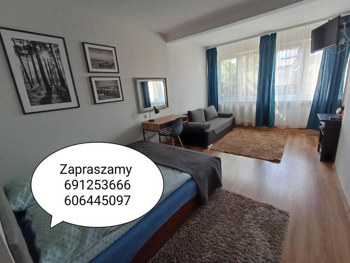Apartament wakacyjny dla 7 osób, z ogród i widok, Dla rodziny w Mikołajki
