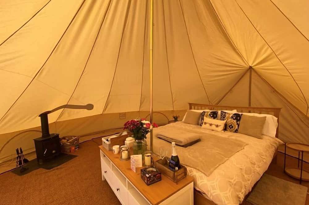 Bell tent in ultimate luxury with a wood fired hot tub, super king size bed in Stafford, Staffordshire