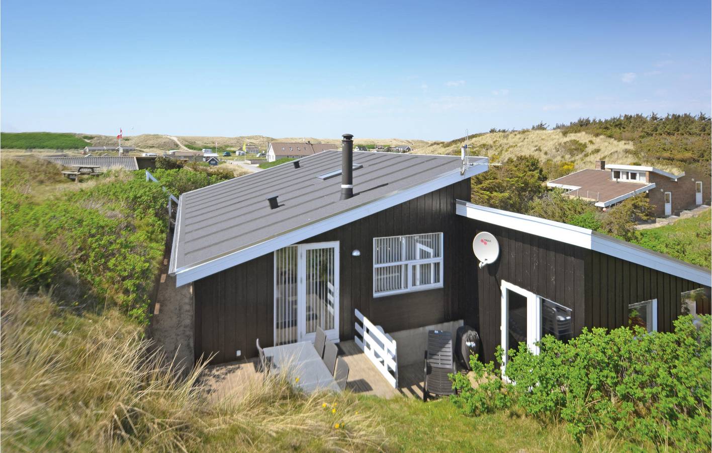 Ferienhaus für 8 Personen mit Terrasse in Årgab, Holmsland Klit