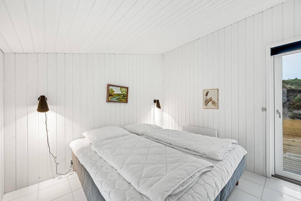 Cosy holiday home with a large terrace, an outdoor hot tub and an outdoor sauna  in Søndervig, Holmsland Klit