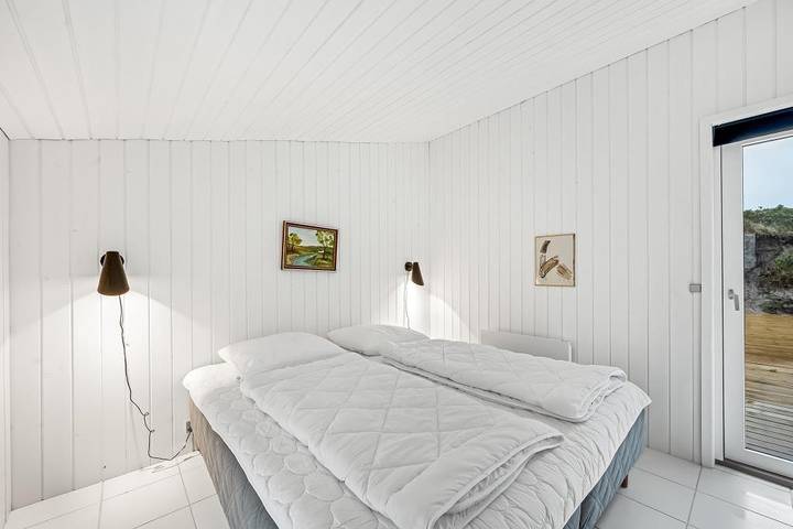 Cosy holiday home with a large terrace, an outdoor hot tub and an outdoor sauna  in Søndervig, Holmsland Klit