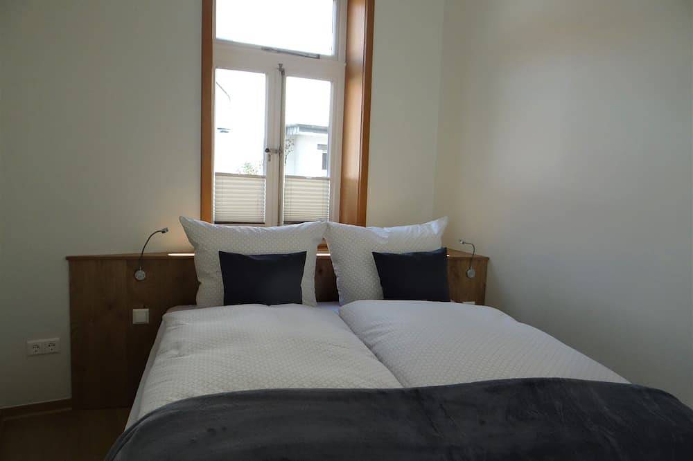 Ganze Wohnung, Modernes Appartement mit Kamin in denkmalgeschütztem Fachwerkhaus am Marktplatz in Bad Essen, Wiehengebirge